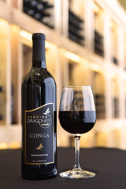 Picture of a bottle and a glass of Conga