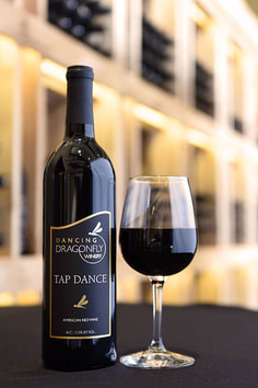 Picture of a bottle and glass of Tap Dance red wine 