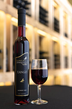Picture of a bottle and a glass of Tango raspberry dessert wine